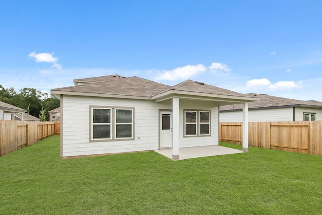 17832 Lionheart Rd, Conroe, TX 77306 - back of property with a patio and roof with shingles