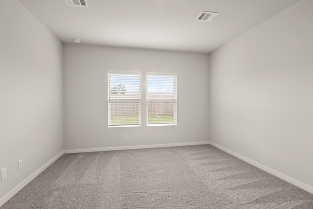 17832 Lionheart Rd, Conroe, TX 77306 - empty room featuring carpet flooring and baseboards