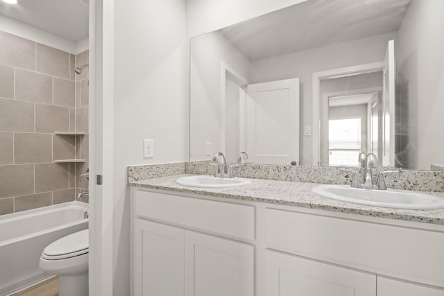 17832 Lionheart Rd, Conroe, TX 77306 - full bath with double vanity, toilet, and shower / washtub combination