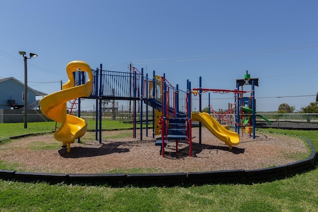communal playground featuring fence