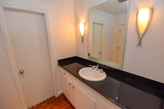 915 Franklin St Unit 4A, Houston, TX 77002 - bathroom with vanity and wood finished floors