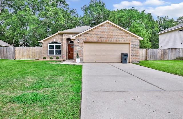 17110 Cutter Way, Crosby, TX 77532 - view of front facade featuring brick siding, a garage, and concrete driveway