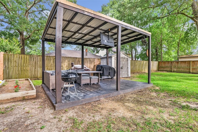 17110 Cutter Way, Crosby, TX 77532 - view of yard featuring a storage unit, a wooden deck, an outbuilding, and a garden