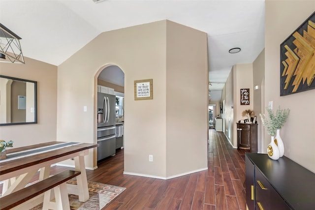17110 Cutter Way, Crosby, TX 77532 - hall with dark wood finished floors, lofted ceiling, arched walkways, and baseboards