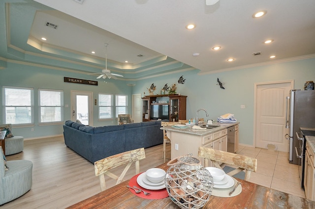 3346 Pirates Cv, Crystal Beach, TX 77650 - interior space with visible vents, a ceiling fan, baseboards, and ornamental molding