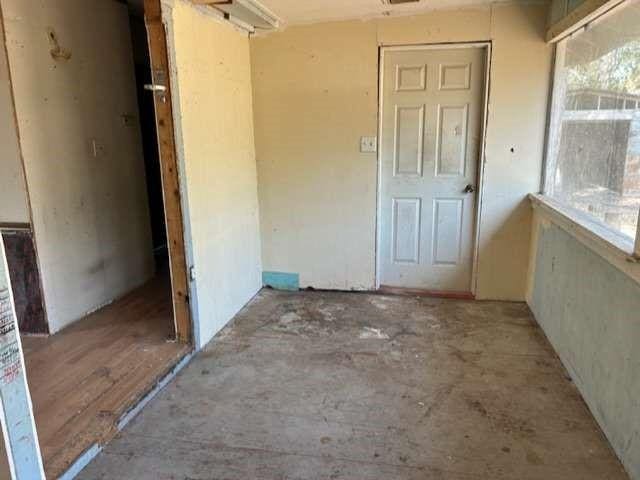 unfurnished room with a wealth of natural light