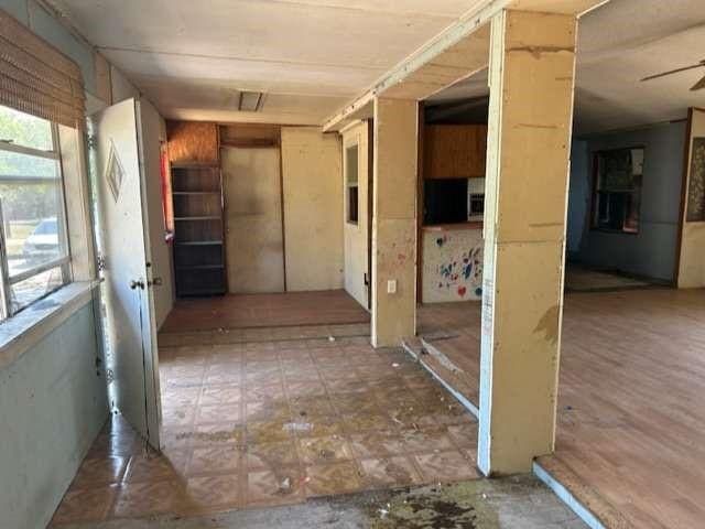 corridor with tile patterned floors