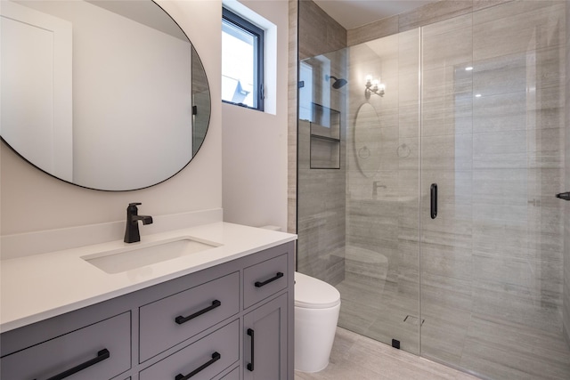 2239 Colquitt St, Houston, TX 77098 - bathroom featuring toilet, a shower stall, and vanity