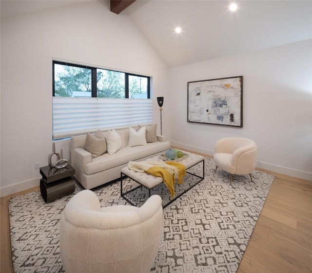 2239 Colquitt St, Houston, TX 77098 - living room featuring beamed ceiling, recessed lighting, high vaulted ceiling, and wood finished floors