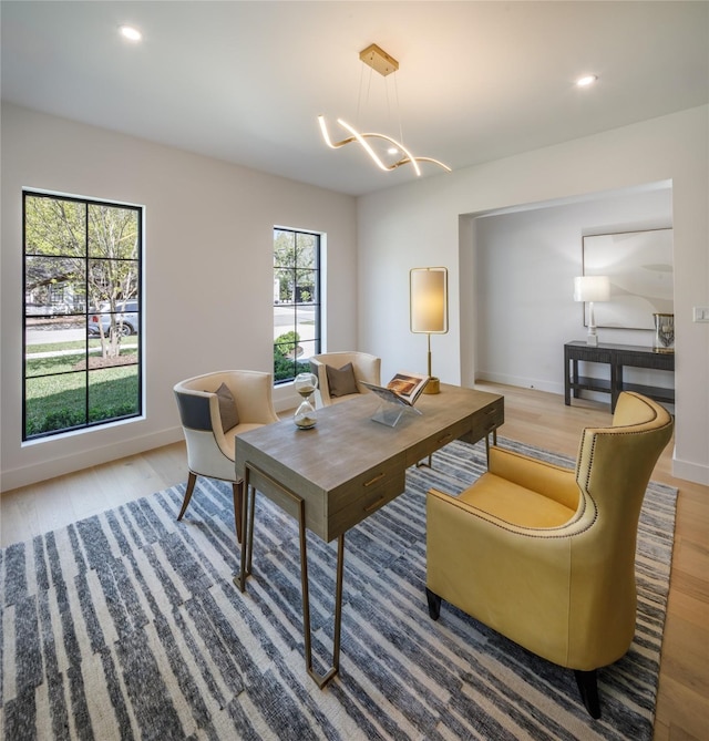 2239 Colquitt St, Houston, TX 77098 - living area featuring an inviting chandelier, baseboards, recessed lighting, and wood finished floors
