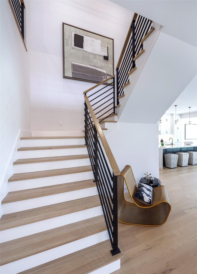 2239 Colquitt St, Houston, TX 77098 - staircase with wood finished floors