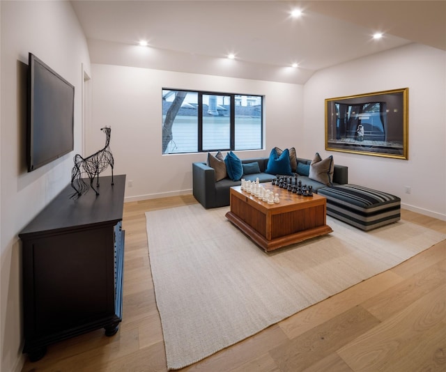 2239 Colquitt St, Houston, TX 77098 - living room featuring recessed lighting, baseboards, and light wood-type flooring