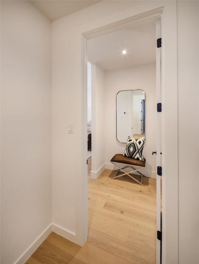 2239 Colquitt St, Houston, TX 77098 - hallway featuring baseboards and light wood-style flooring