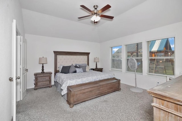 carpeted bedroom featuring a ceiling fan and baseboards