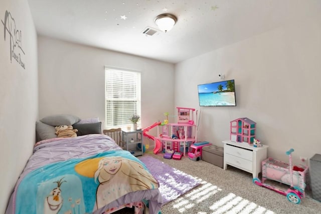carpeted bedroom with visible vents