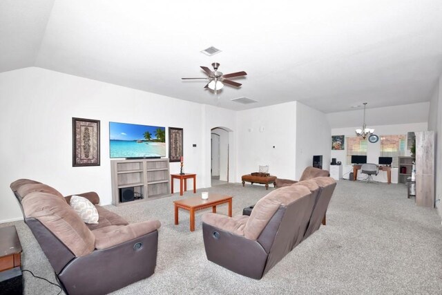 carpeted living area featuring arched walkways, lofted ceiling, visible vents, and ceiling fan with notable chandelier