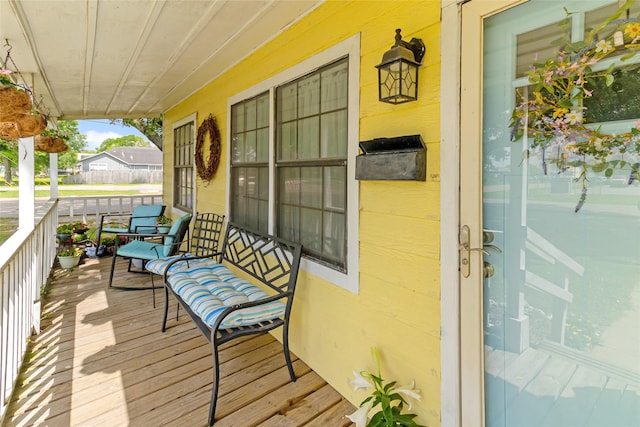 wooden deck with covered porch