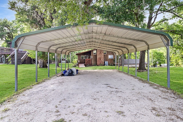 12 Walker Trl, Huntsville, TX 77320 - surrounding community featuring a carport and a lawn