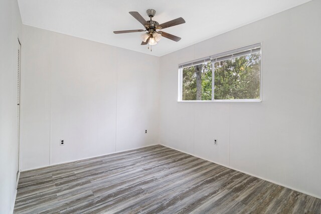 12 Walker Trl, Huntsville, TX 77320 - unfurnished room with wood finished floors and ceiling fan