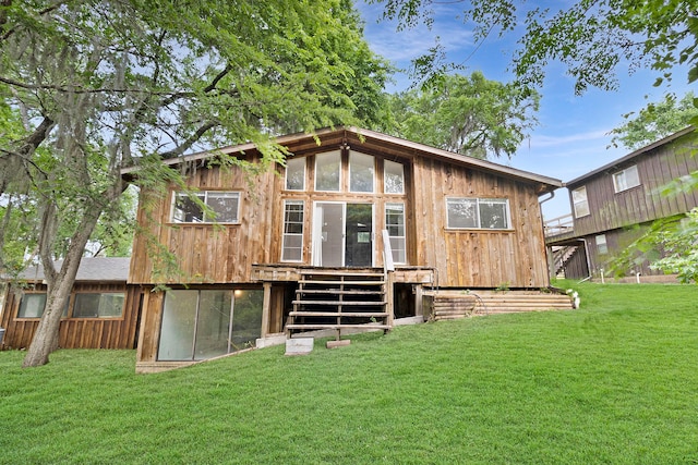 12 Walker Trl, Huntsville, TX 77320 - back of house with a yard and a wooden deck
