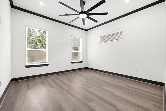 7038 Smilax St A-B, Unit A-B Houston, TX 77088 - empty room with ornamental molding, ceiling fan, wood finished floors, recessed lighting, and baseboards