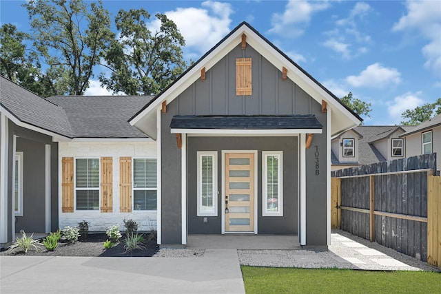 7038 Smilax St A-B, Unit A-B Houston, TX 77088 - view of front of home featuring board and batten siding and a shingled roof