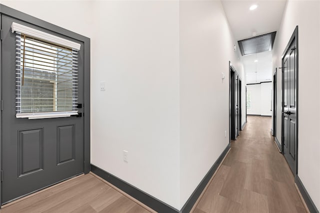 7038 Smilax St A-B, Unit A-B Houston, TX 77088 - hall featuring attic access, light wood-type flooring, baseboards, and recessed lighting