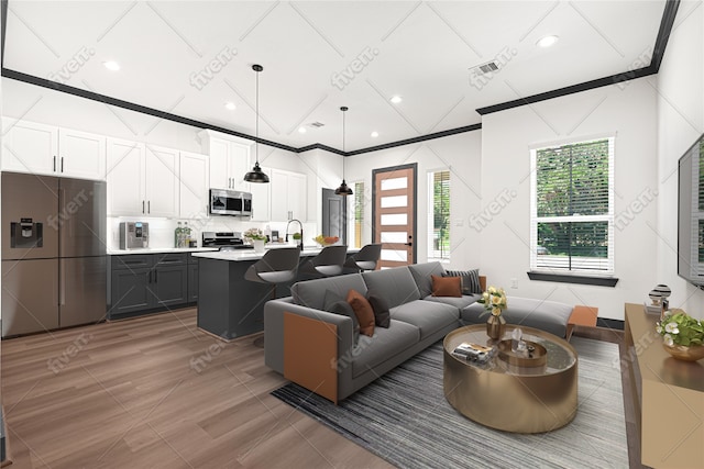 7038 Smilax St A-B, Unit A-B Houston, TX 77088 - living room with recessed lighting and crown molding