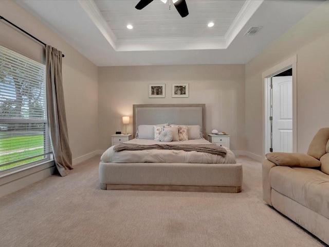 carpeted bedroom featuring recessed lighting, a raised ceiling, visible vents, and baseboards