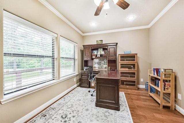 office area with ornamental molding, baseboards, light wood-style floors, recessed lighting, and a ceiling fan