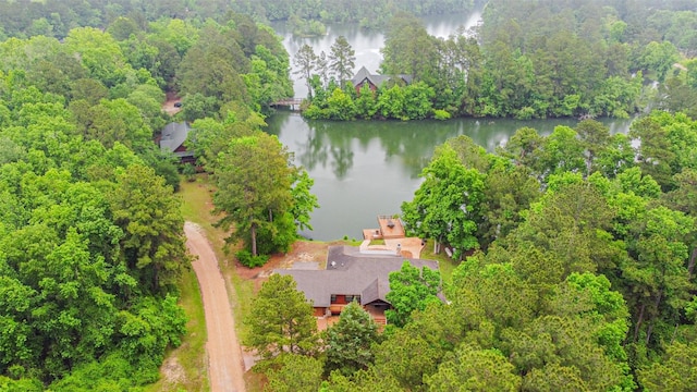 aerial view featuring a water view and a forest view