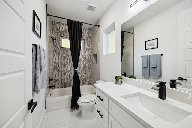 full bath featuring visible vents, shower / tub combo, vanity, toilet, and marble finish floor