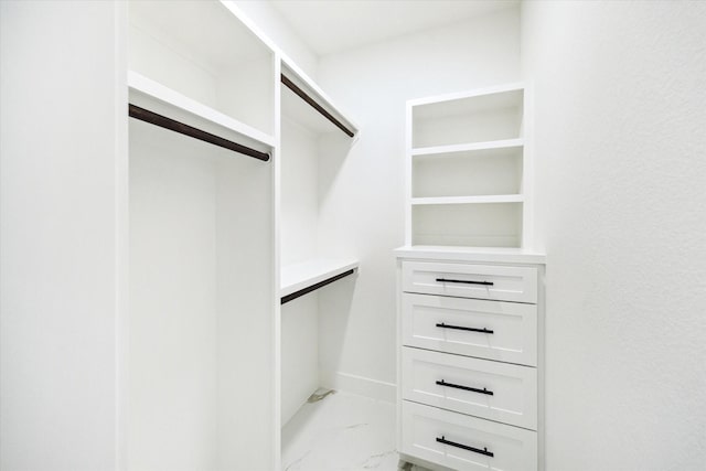 671 Rd 6609, Dayton, TX 77535 - spacious closet with marble finish flooring