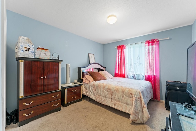 bedroom with light colored carpet
