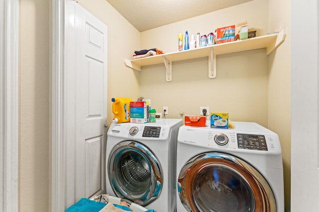 laundry area featuring laundry area and washing machine and dryer