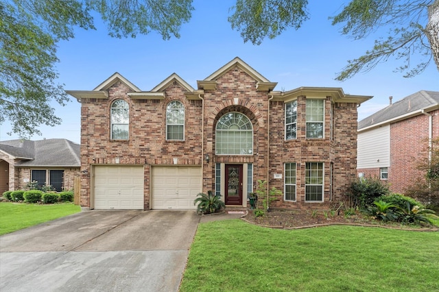 view of front of house featuring brick siding, a front lawn, an attached garage, and concrete driveway