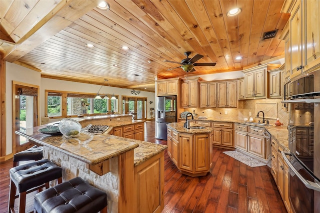 kitchen featuring a sink, wood ceiling, a large island with sink, and stainless steel fridge with ice dispenser