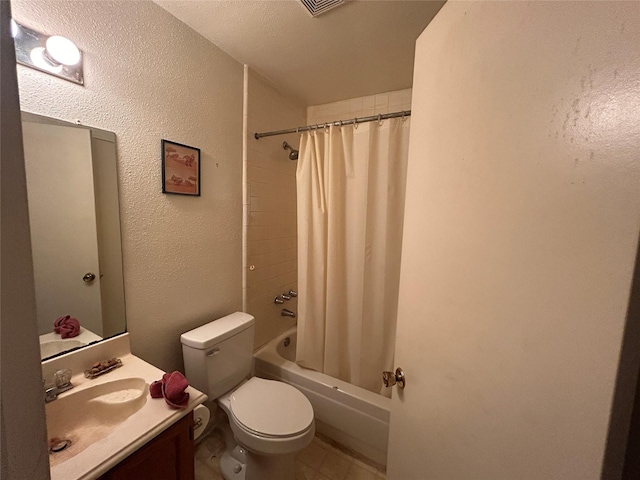 7810 Sawmill Trl, Houston, TX 77040 - full bath with toilet, shower / tub combo with curtain, vanity, a textured wall, and tile patterned flooring