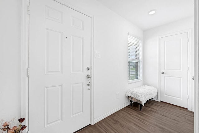 foyer entrance featuring recessed lighting, baseboards, and dark wood-style flooring