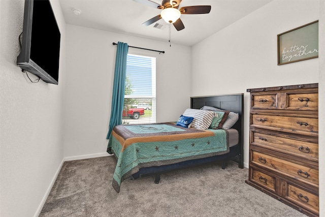bedroom featuring visible vents, baseboards, a ceiling fan, and carpet flooring