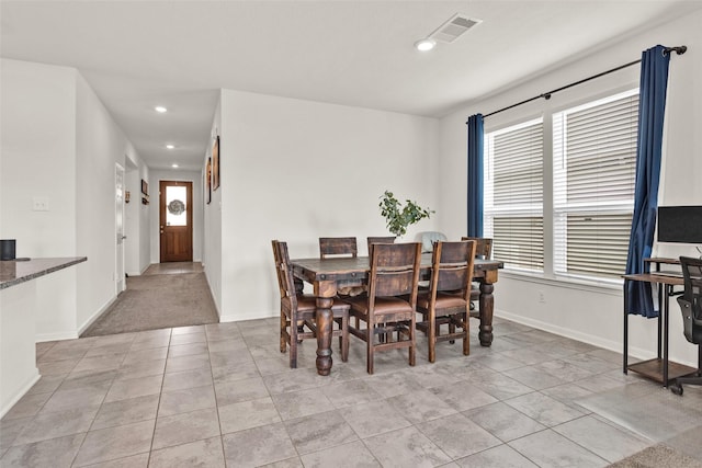 dining area featuring baseboards, visible vents, recessed lighting, and light tile patterned floors