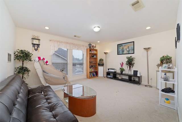 carpeted living room with baseboards, visible vents, and recessed lighting