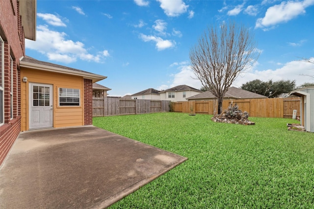 view of yard with a patio and a fenced backyard