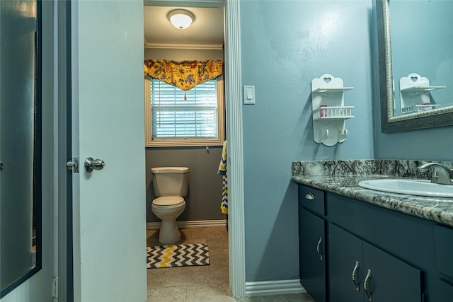 120 Sugar Ln, Lufkin, TX 75904 - bathroom featuring toilet, vanity, and baseboards