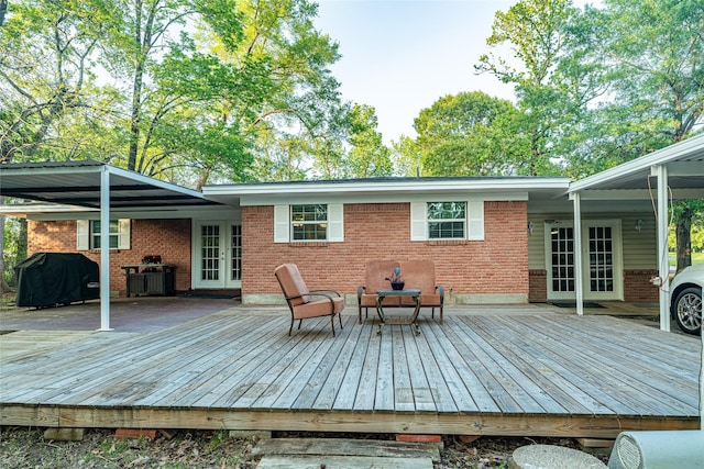 120 Sugar Ln, Lufkin, TX 75904 - wooden terrace featuring area for grilling and french doors