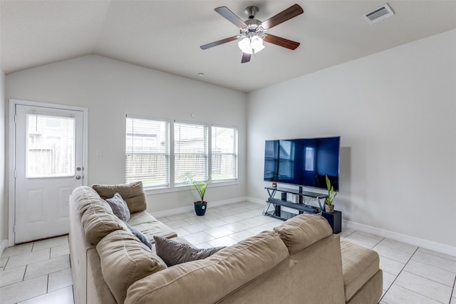 living area with ceiling fan, a healthy amount of sunlight, light tile patterned flooring, and visible vents
