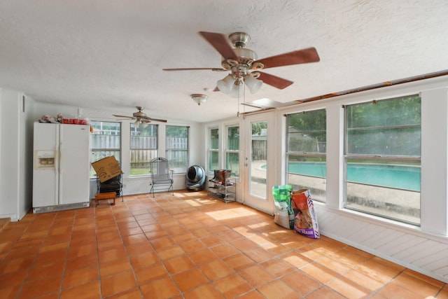 9 Slover Dr, Dayton, TX 77535 - sunroom / solarium featuring a textured ceiling and tile patterned floors
