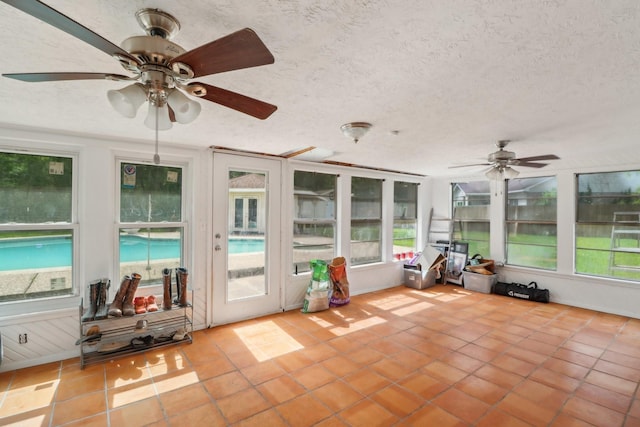 9 Slover Dr, Dayton, TX 77535 - sunroom / solarium featuring a textured ceiling and tile patterned flooring