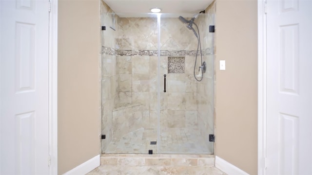 26 Royal Dalton Cir, Conroe, TX 77304 - bathroom with baseboards and a shower stall