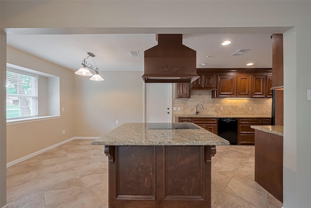 kitchen with visible vents, premium range hood, black appliances, and tasteful backsplash